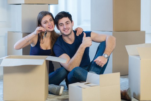 Furniture removals team handling a move in Shepherds Bush with local street access