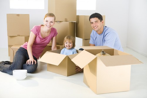Removal van and moving team preparing a Shepherds Bush house move