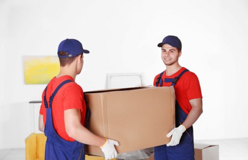 Removal team planning a move in a Shepherds Bush street