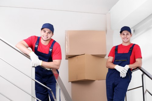 Removal team preparing items for a house move
