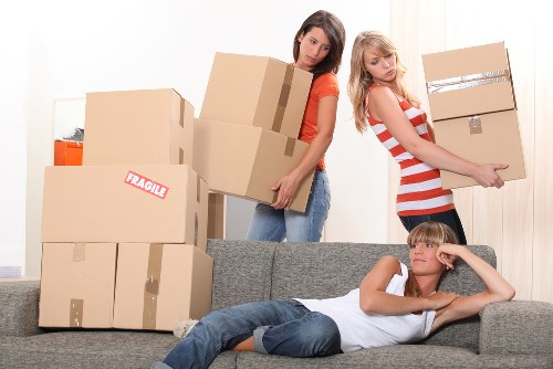Loading furniture into a van for a Shepherds Bush collection